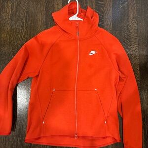 Orange Nike tech
